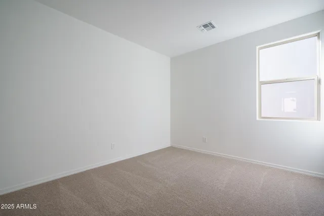 a view of a living room and a fireplace
