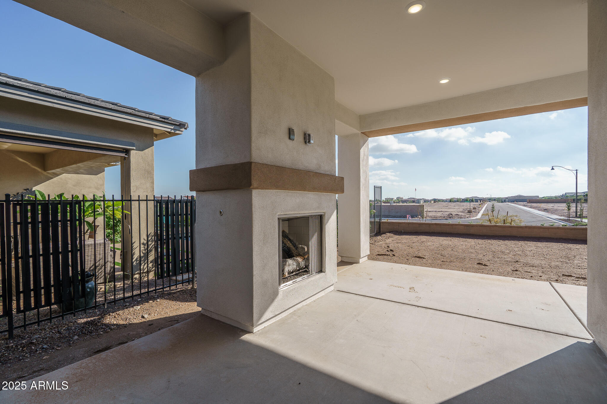20607 West Rancho Drive Buckeye, AZ 85396 - Photo 19 of 32 a view of a living room and a fireplace