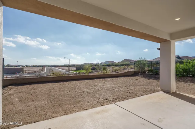 a view of a hallway with washer and dryer
