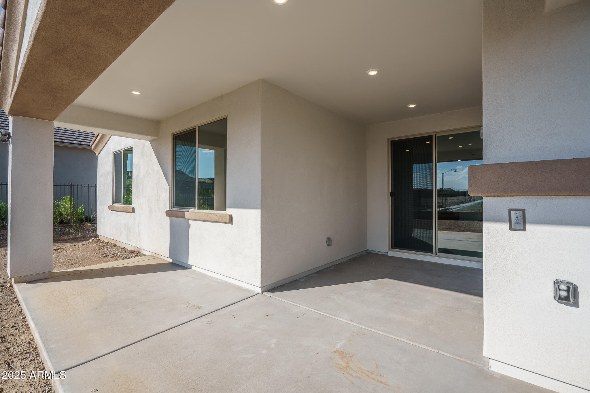 20607 West Rancho Drive Buckeye, AZ 85396 - Photo 21 of 32 a view of a hallway with kitchen and entryway