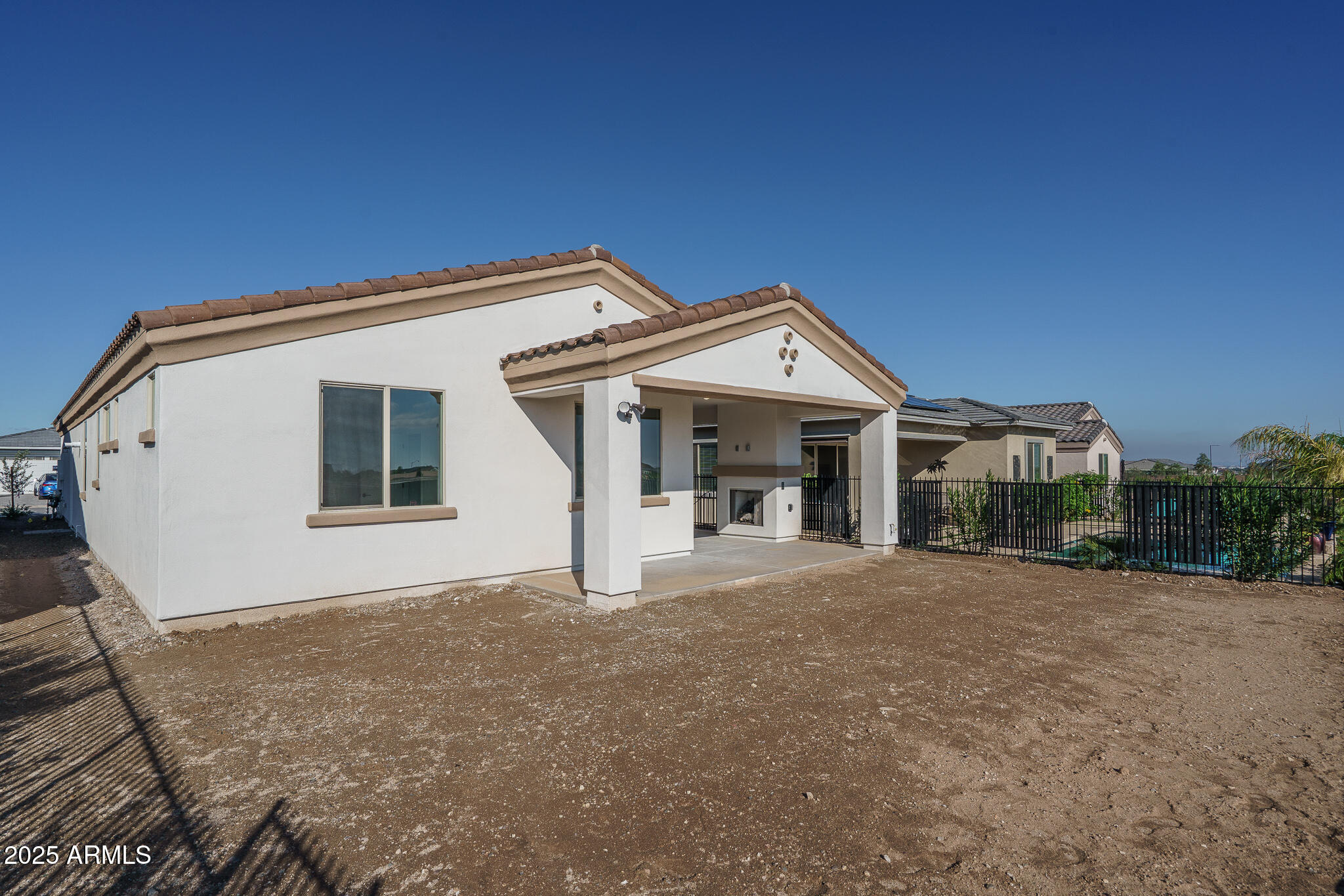 20607 West Rancho Drive Buckeye, AZ 85396 - Photo 25 of 32 a front view of a house with a porch