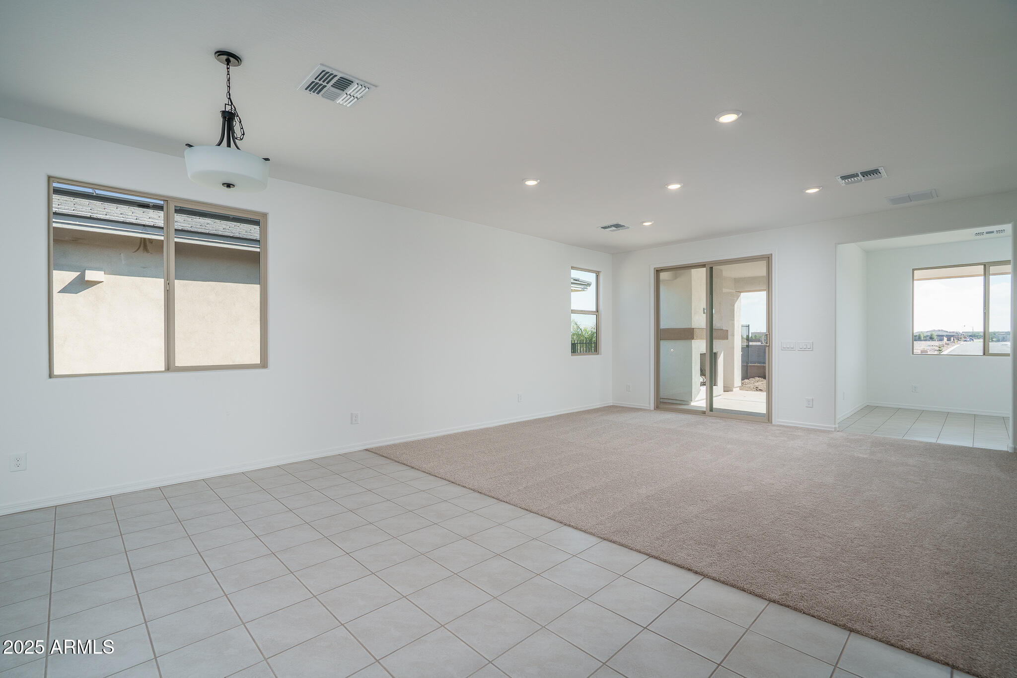 20607 West Rancho Drive Buckeye, AZ 85396 - Photo 9 of 32 a view of an empty room with window