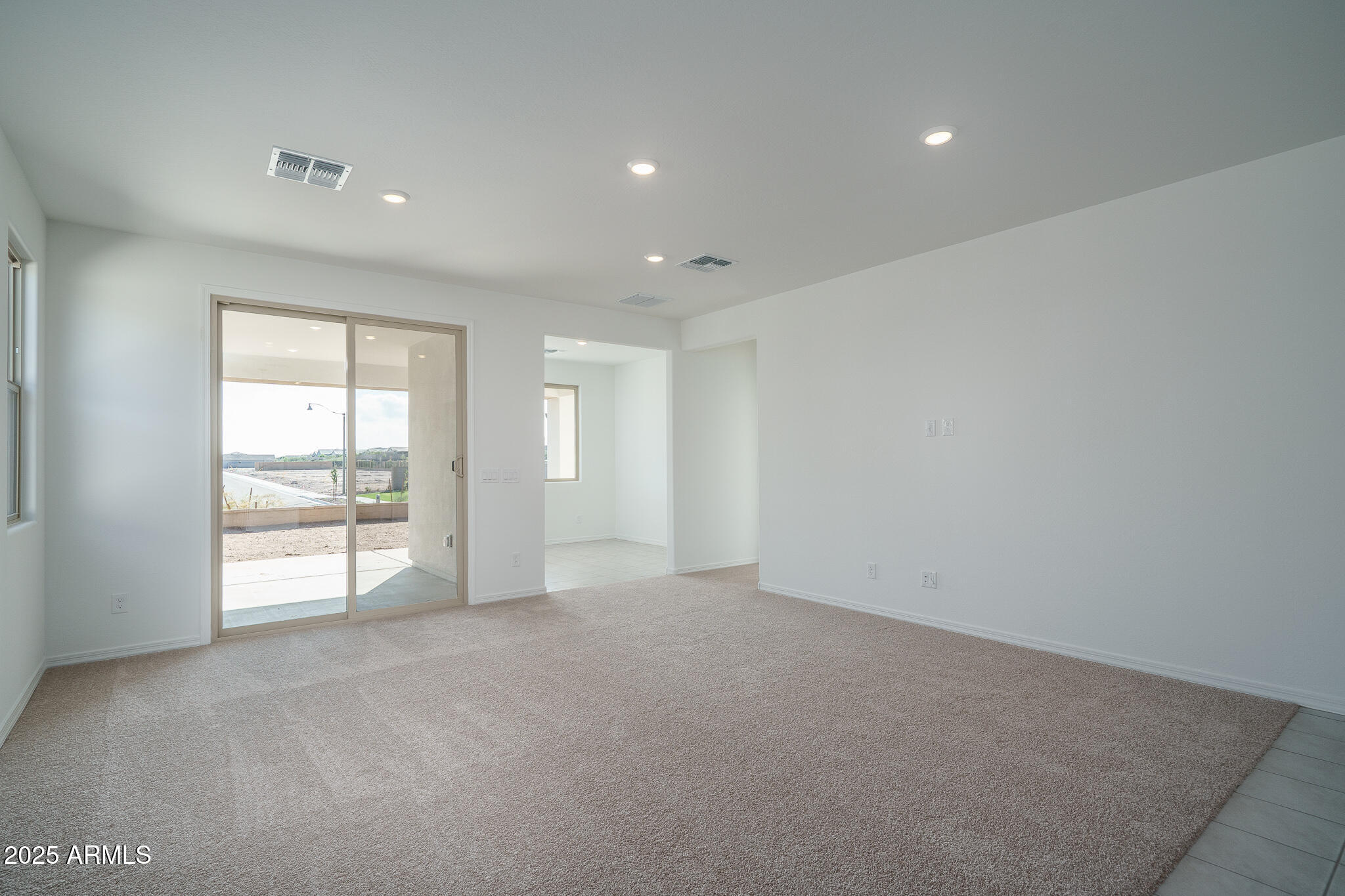 20607 West Rancho Drive Buckeye, AZ 85396 - Photo 10 of 32 a view of an empty room with a window