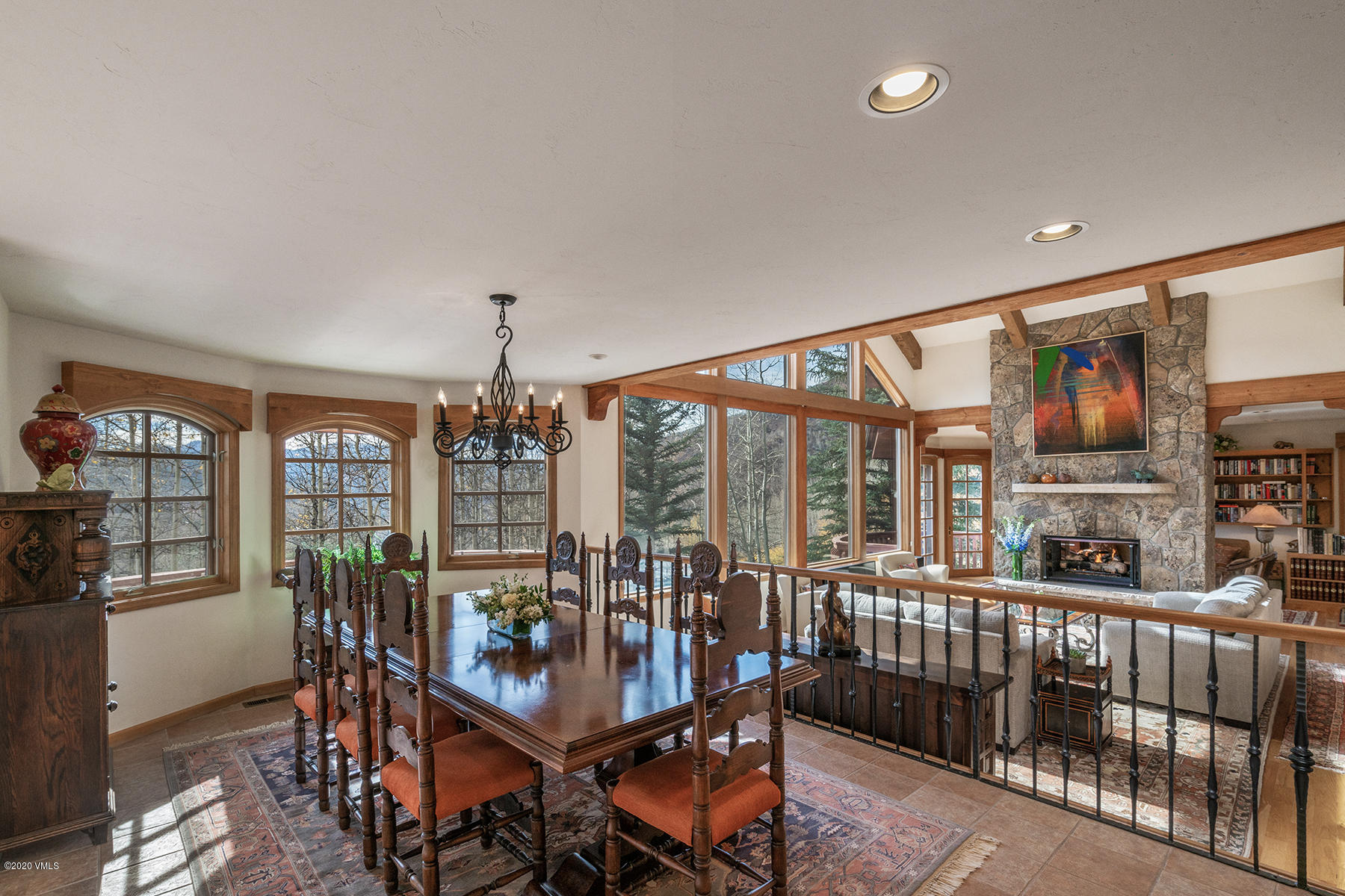 781 Potato Patch Drive Vail, CO 81657 - Photo 11 of 39 a view of a dining room with furniture window and wooden floor