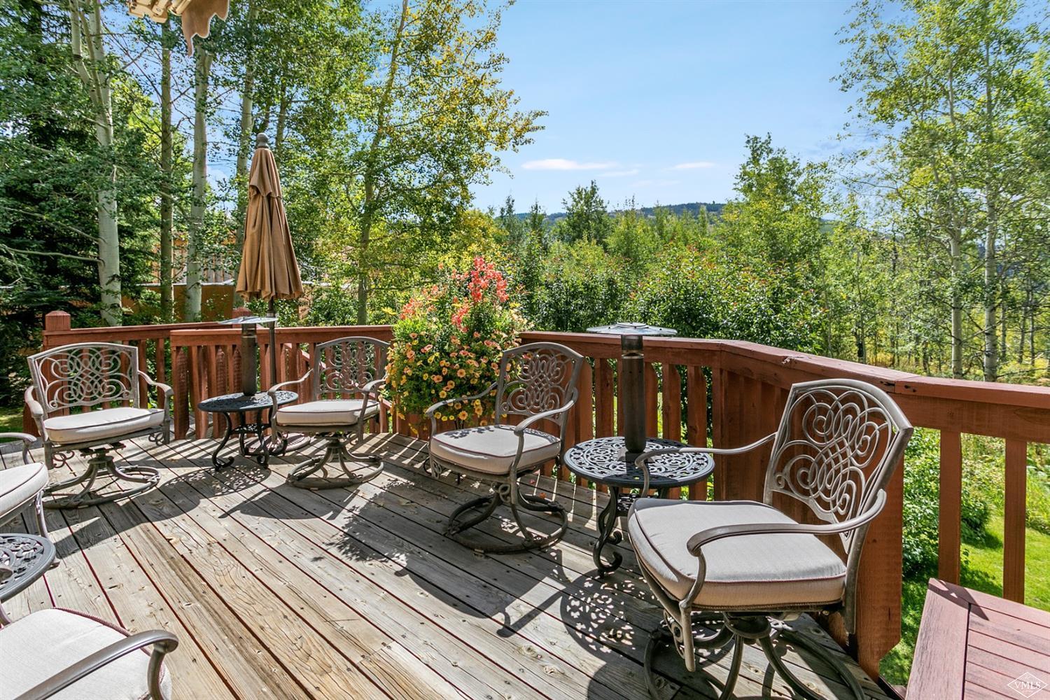781 Potato Patch Drive Vail, CO 81657 - Photo 14 of 39 a view of a balcony with chairs and wooden floor