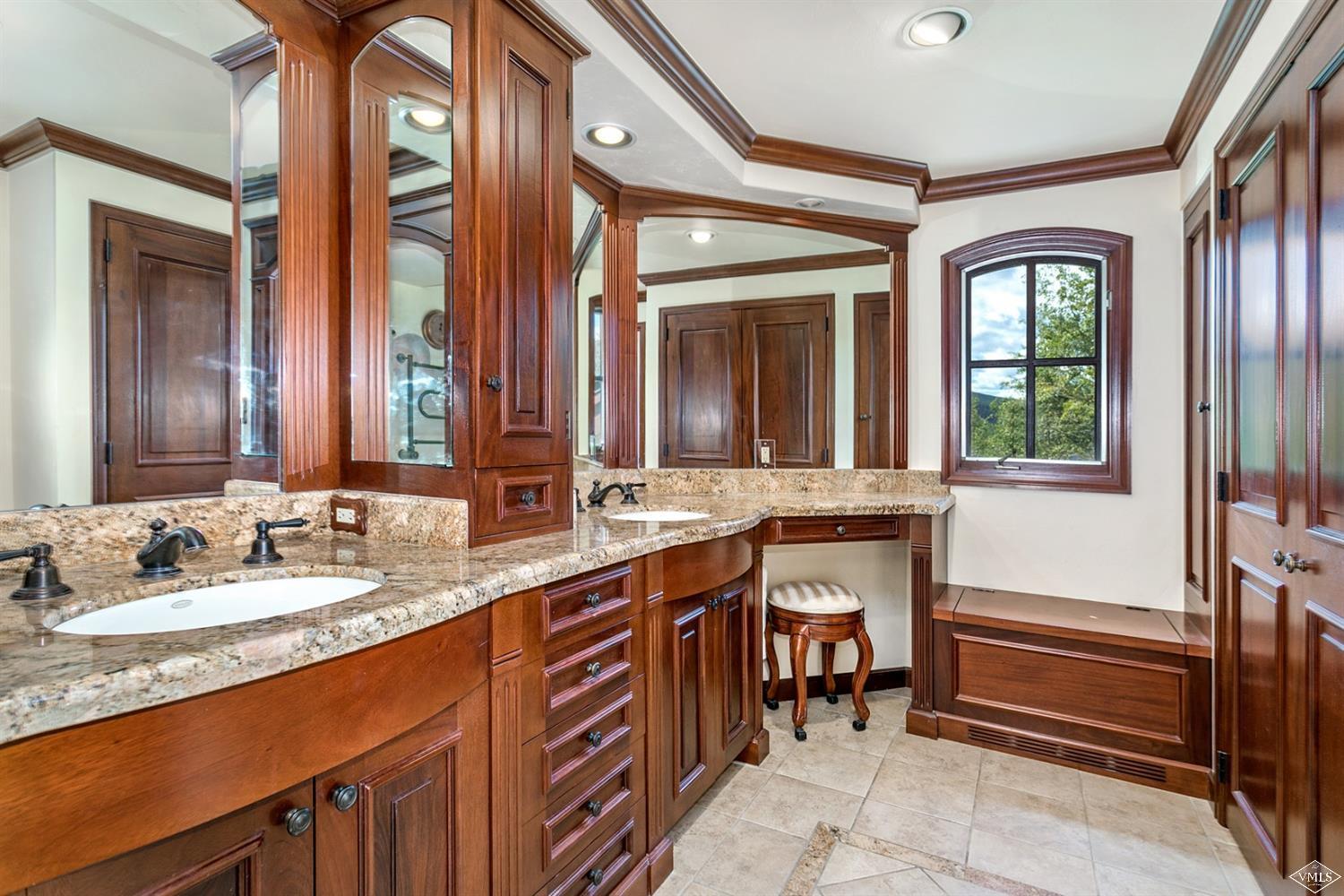 781 Potato Patch Drive Vail, CO 81657 - Photo 18 of 39 a bathroom with a sink and a mirror