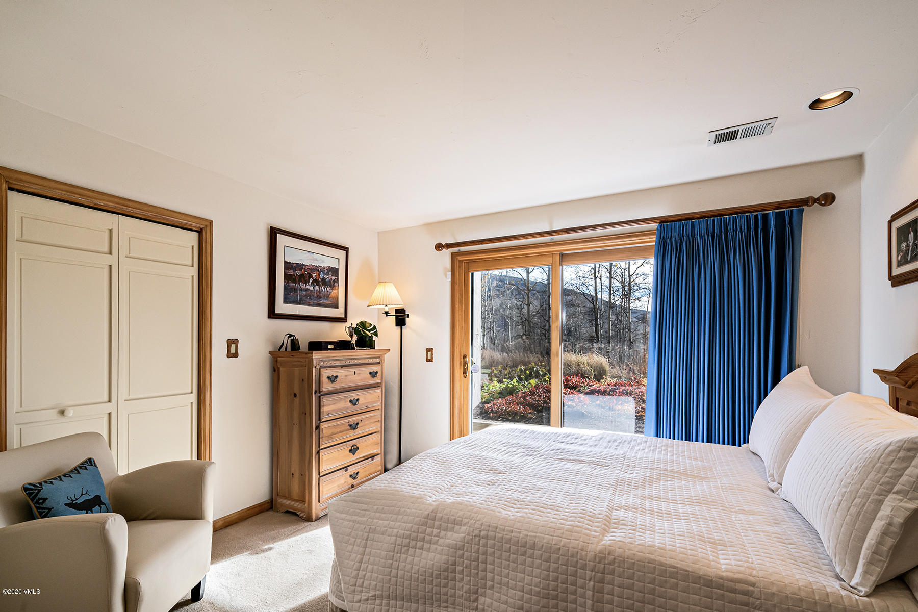 781 Potato Patch Drive Vail, CO 81657 - Photo 20 of 39 a bedroom with a bed and wooden floor