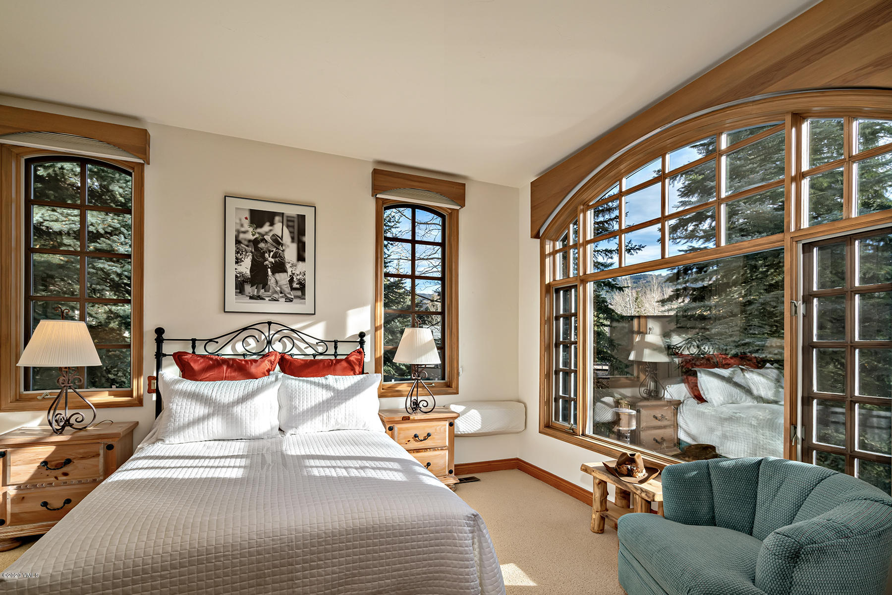 781 Potato Patch Drive Vail, CO 81657 - Photo 23 of 39 a bedroom with furniture and a large window