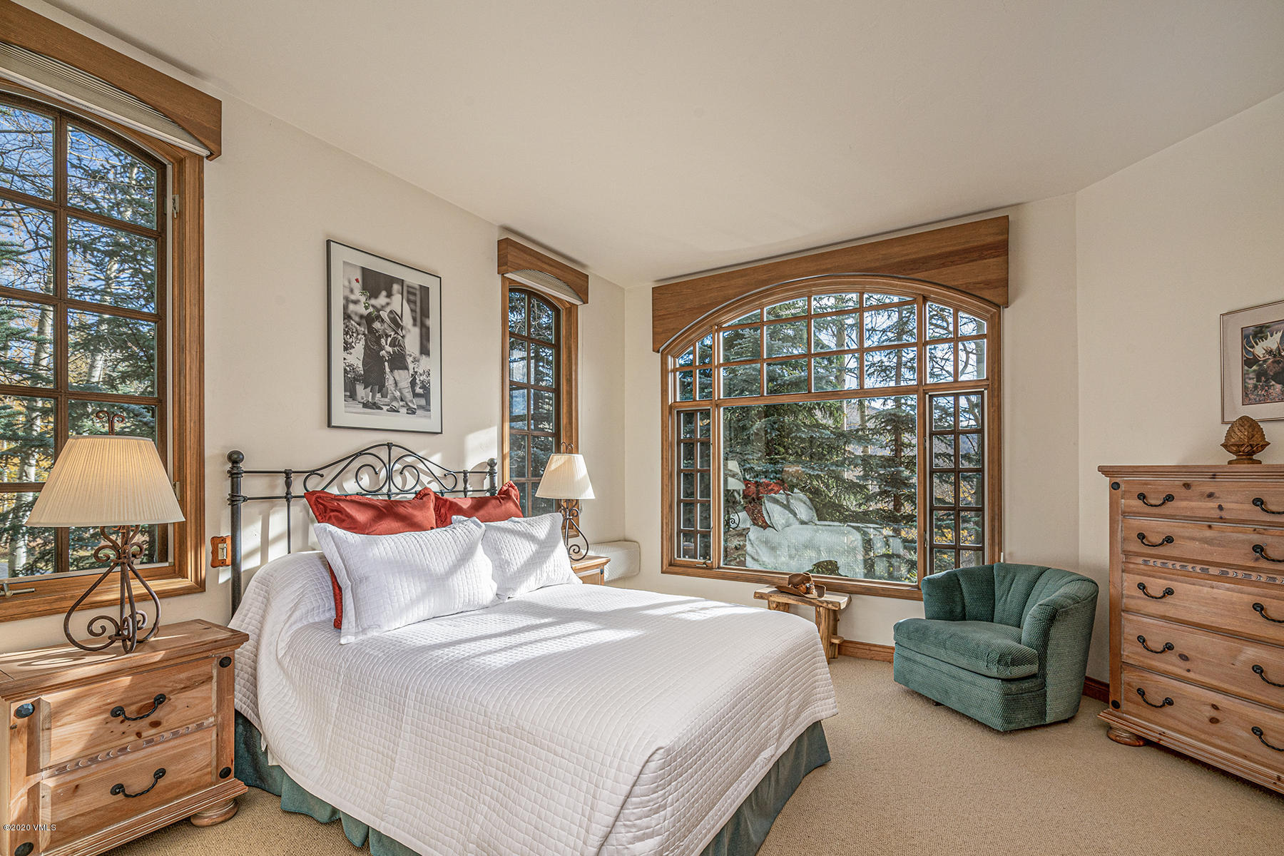 781 Potato Patch Drive Vail, CO 81657 - Photo 24 of 39 a bedroom with a bed and a large window