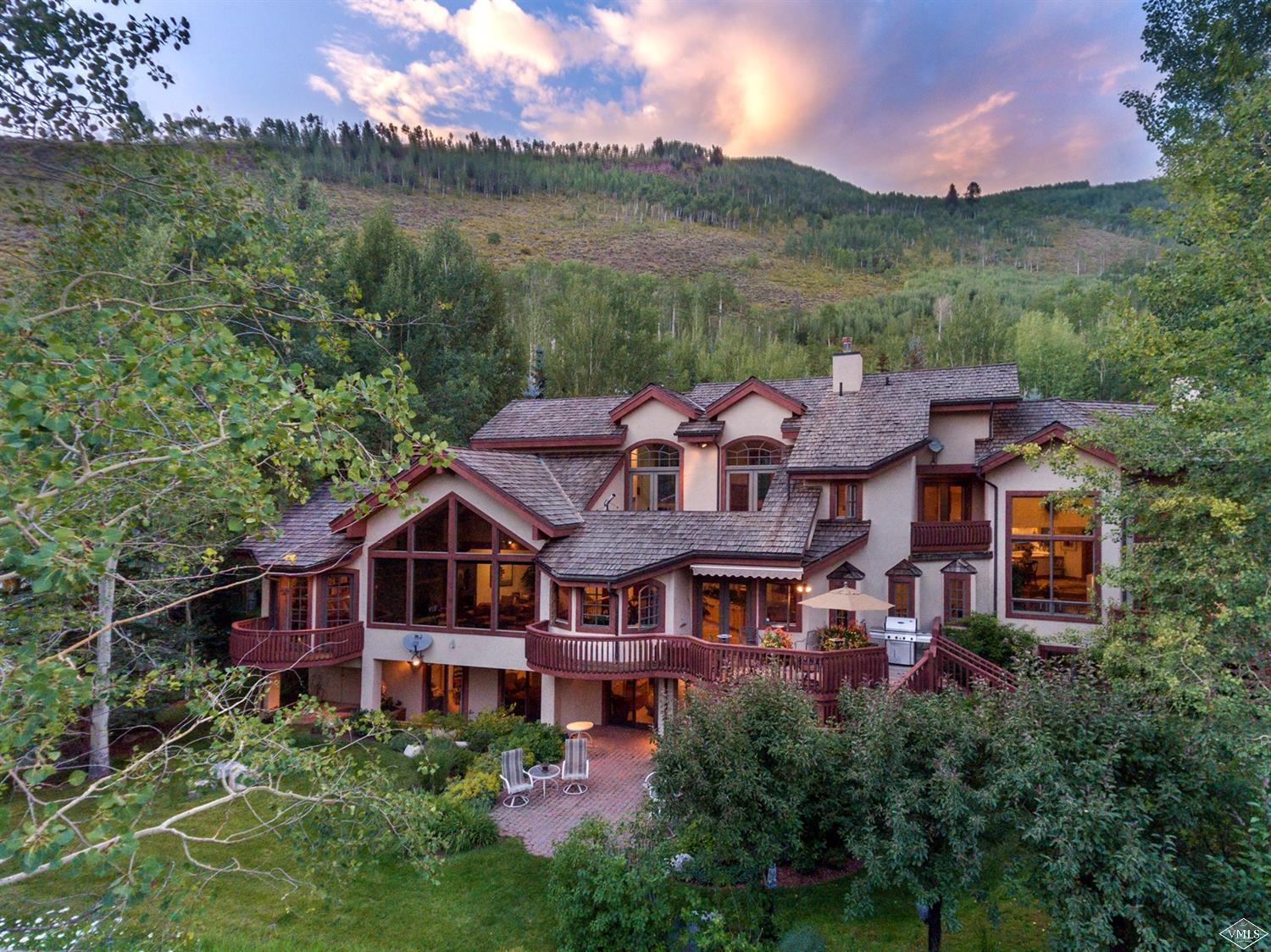 781 Potato Patch Drive Vail, CO 81657 - Photo 3 of 39 a view of a town with large trees and a barn in it