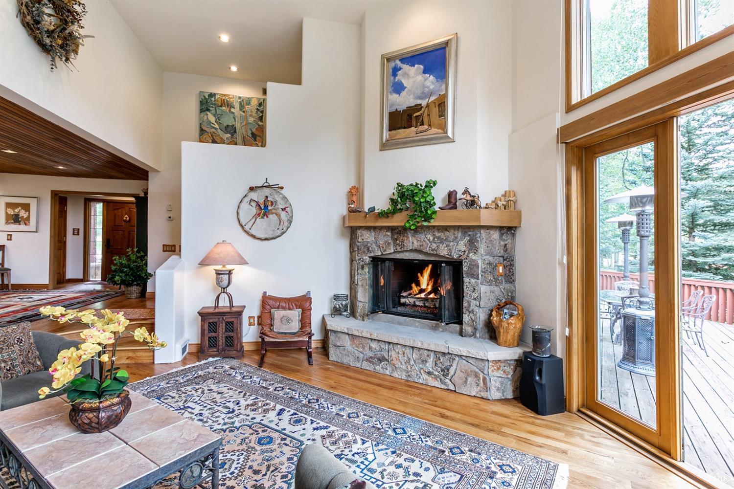 781 Potato Patch Drive Vail, CO 81657 - Photo 31 of 39 a living room with furniture and a fireplace