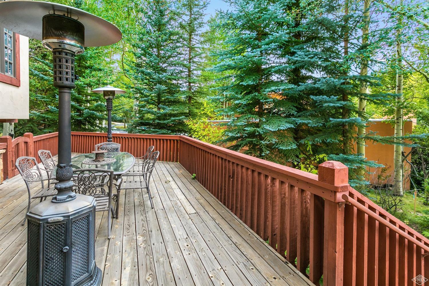 781 Potato Patch Drive Vail, CO 81657 - Photo 32 of 39 a balcony with wooden floor and outdoor seating