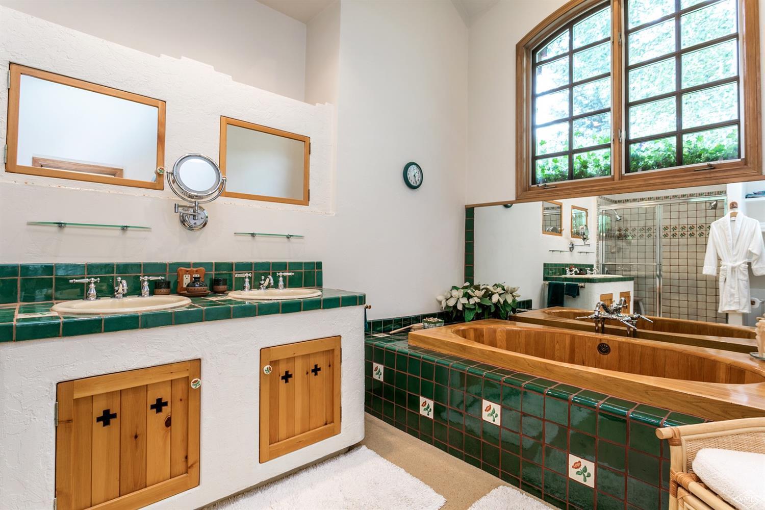 781 Potato Patch Drive Vail, CO 81657 - Photo 36 of 39 a kitchen with stainless steel appliances granite countertop a sink and a stove