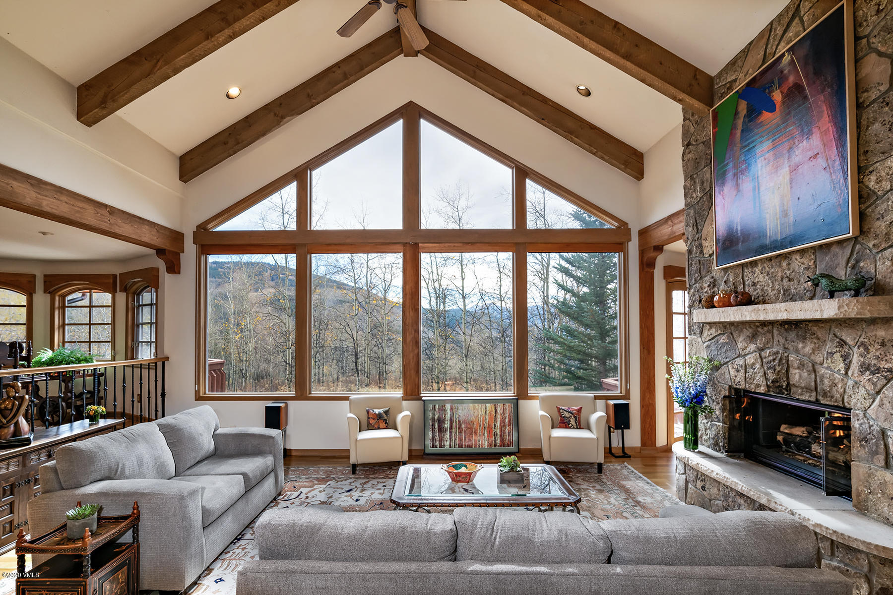 781 Potato Patch Drive Vail, CO 81657 - Photo 4 of 39 a living room with furniture and a fireplace