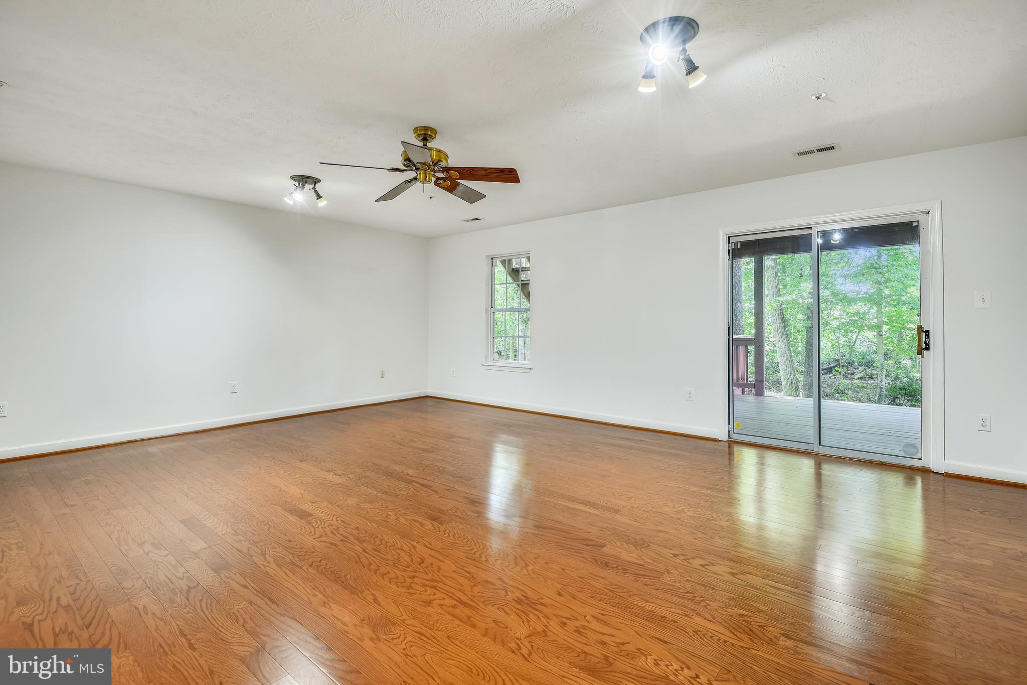 1294 Breckenridge Circle Riva, MD 21140 - Photo 32 of 64 Lower Level Family Room With Access To Lower Deck