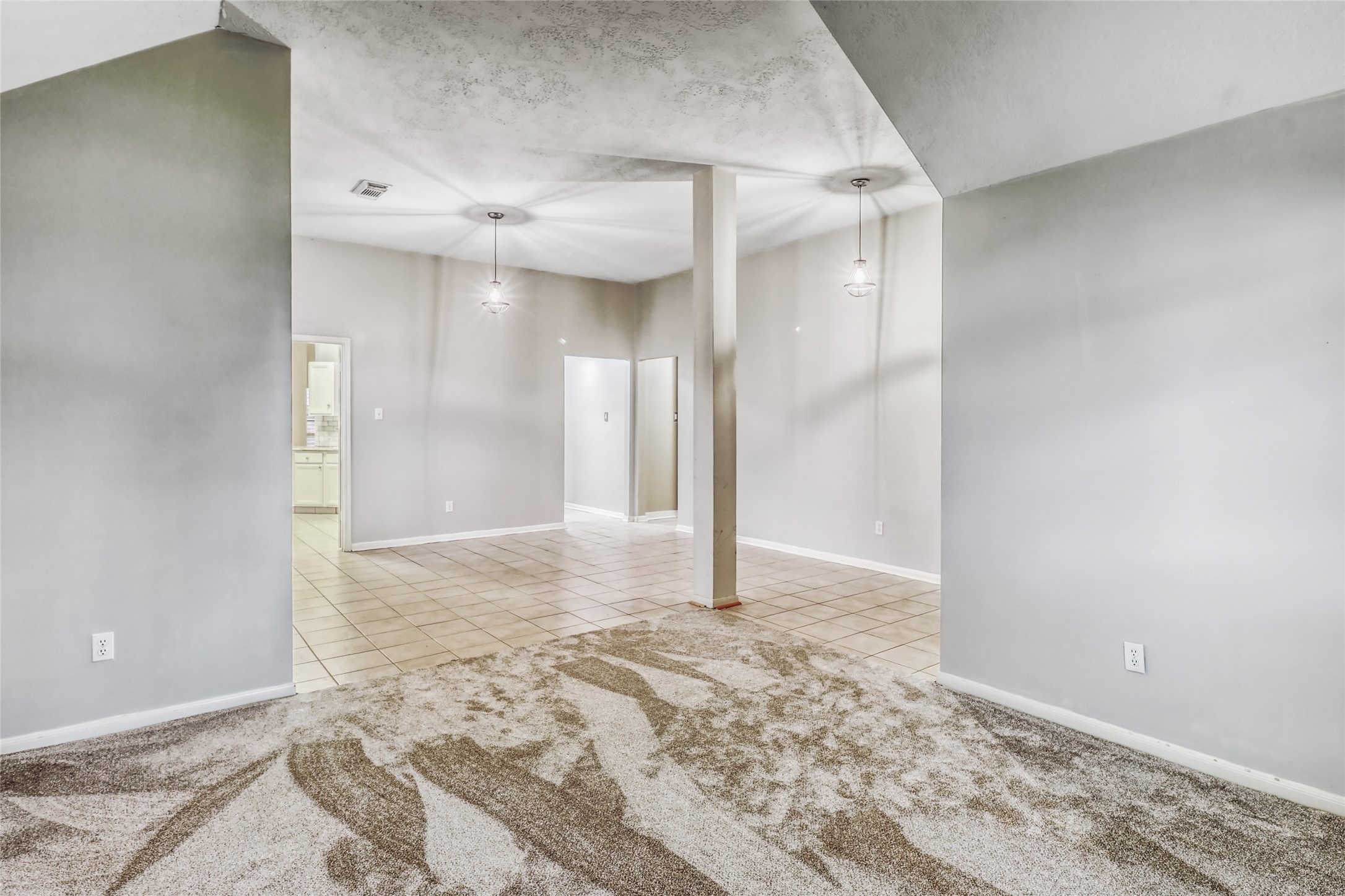7215 Pembrough Lane Katy, TX 77494 - Photo 5 of 20 a view of a big room with wooden floor and bathroom