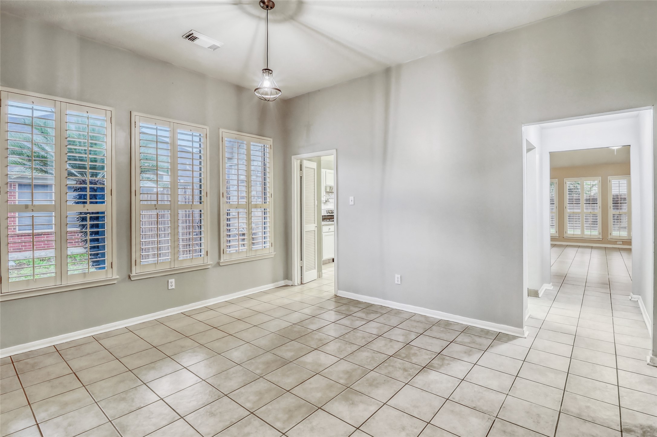 7215 Pembrough Lane Katy, TX 77494 - Photo 8 of 20 a view of an empty room and window