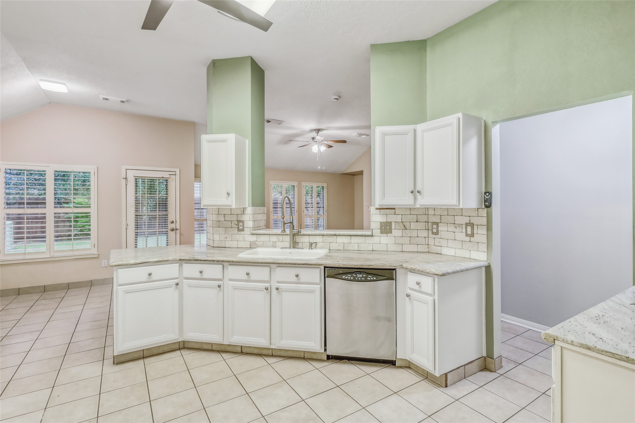 7215 Pembrough Lane Katy, TX 77494 - Photo 10 of 20 a kitchen with a sink and cabinets