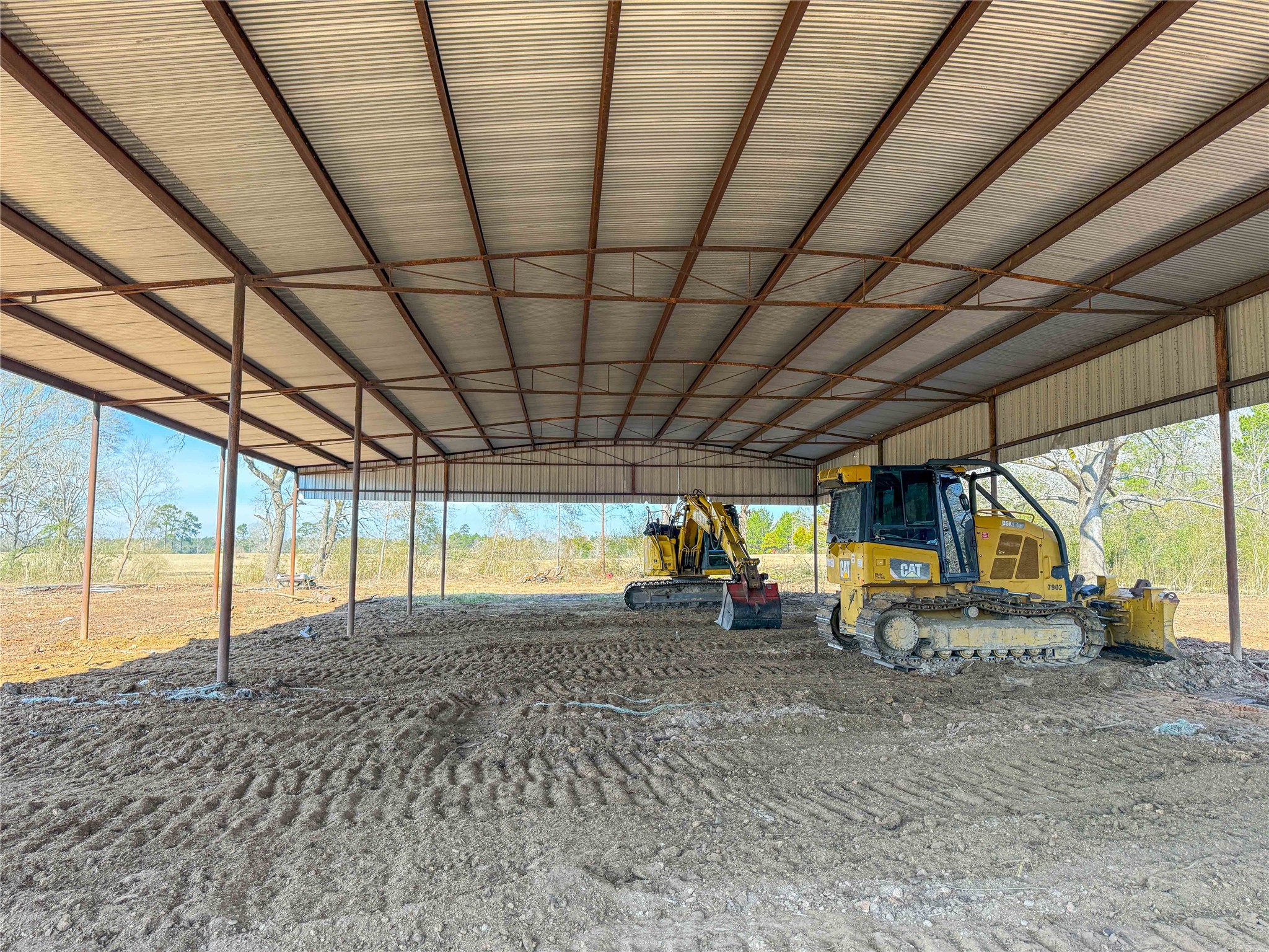 4 County Road 2780 Colmesneil, TX 75938 - Photo 12 of 50 a view of a room with wooden roof