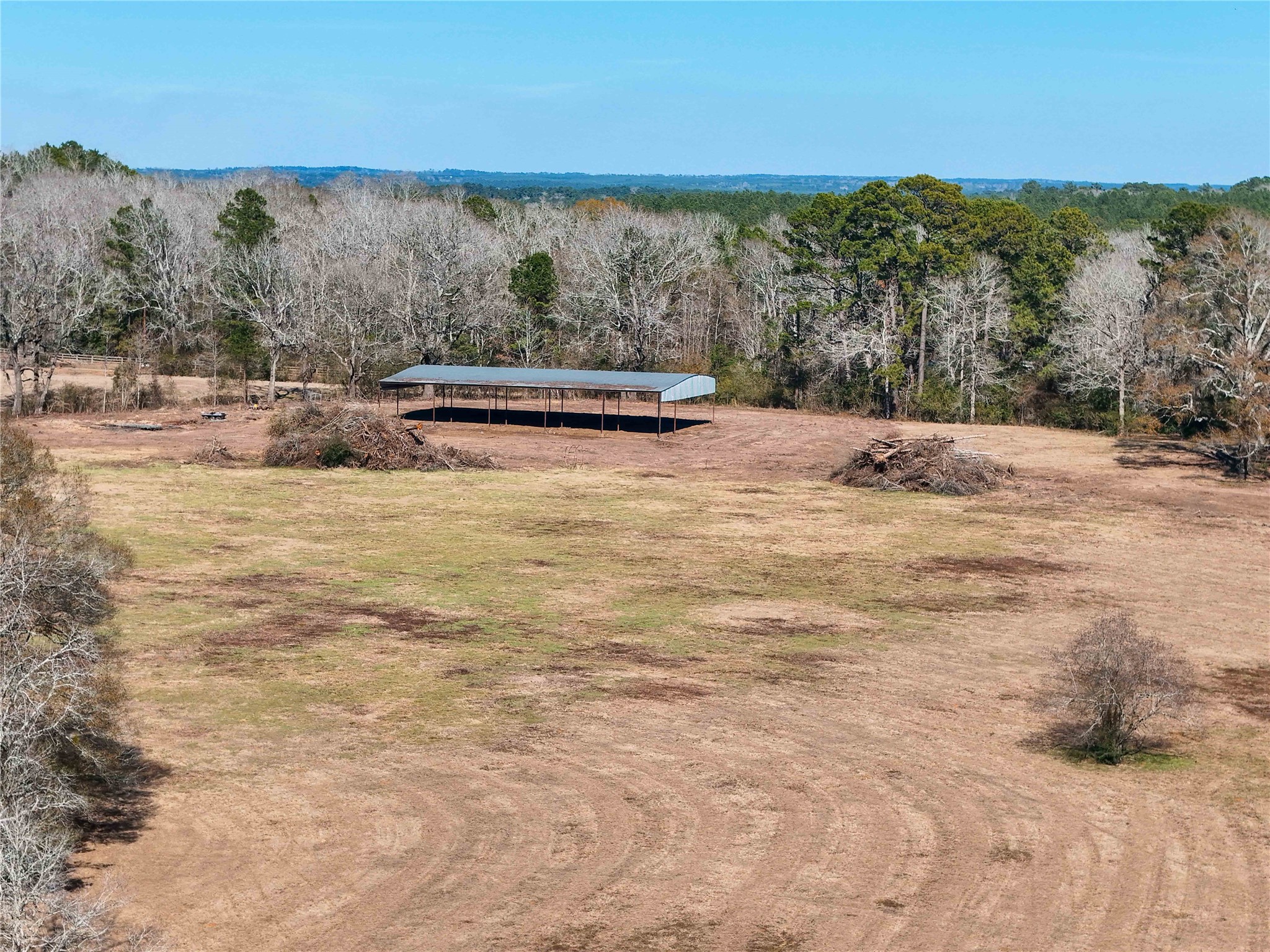4 County Road 2780 Colmesneil, TX 75938 - Photo 33 of 50 a view of a yard with mountain