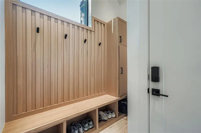 a bathroom with a shower and a sink