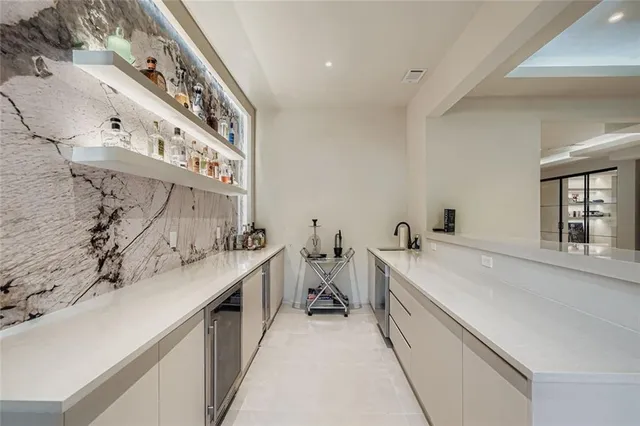 a view of an empty room and a window