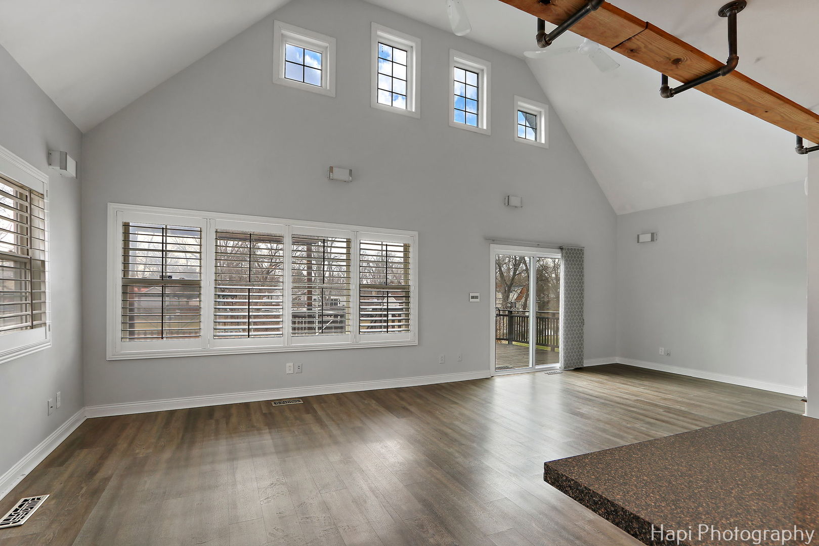 35522 North Wilson Road Ingleside, IL 60041 - Photo 8 of 40 a view of an empty room with wooden floor and a window