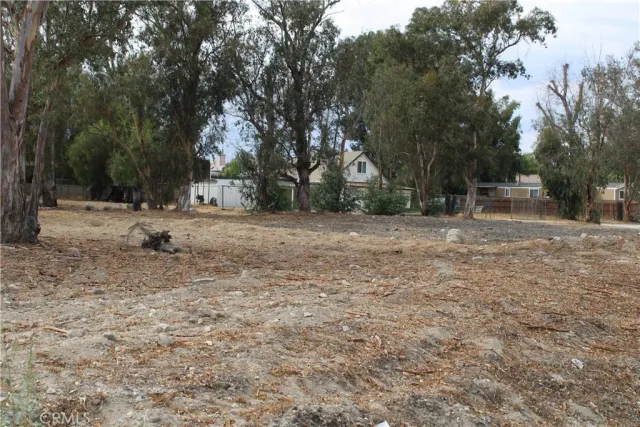 a fire hydrant in the middle of a field