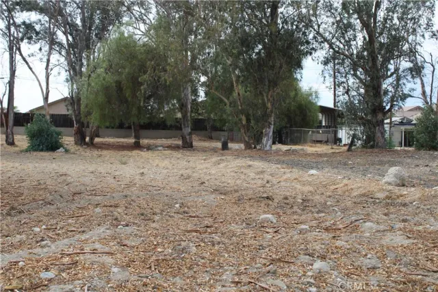 a fire hydrant in the middle of a field