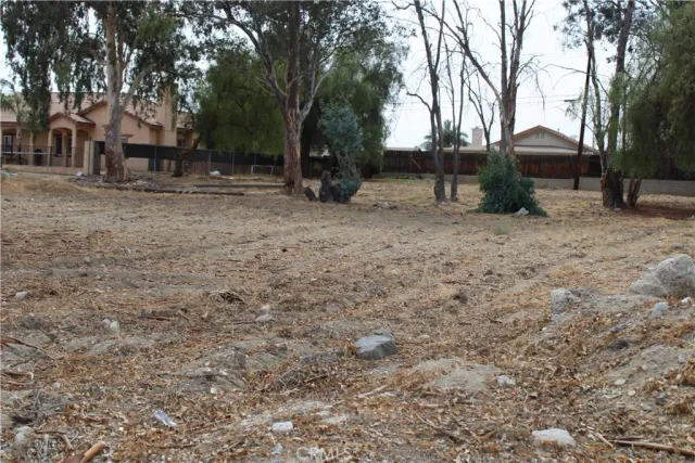 a view of house with a backyard space