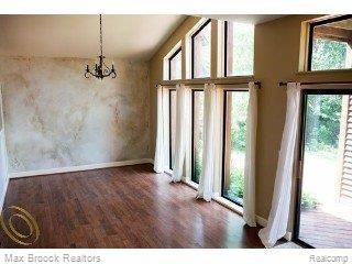 9645 Norman Road Clarkston, MI 48348 - Photo 4 of 16 Full wall of glass overlooking