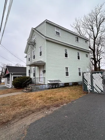 a view of a house with a patio