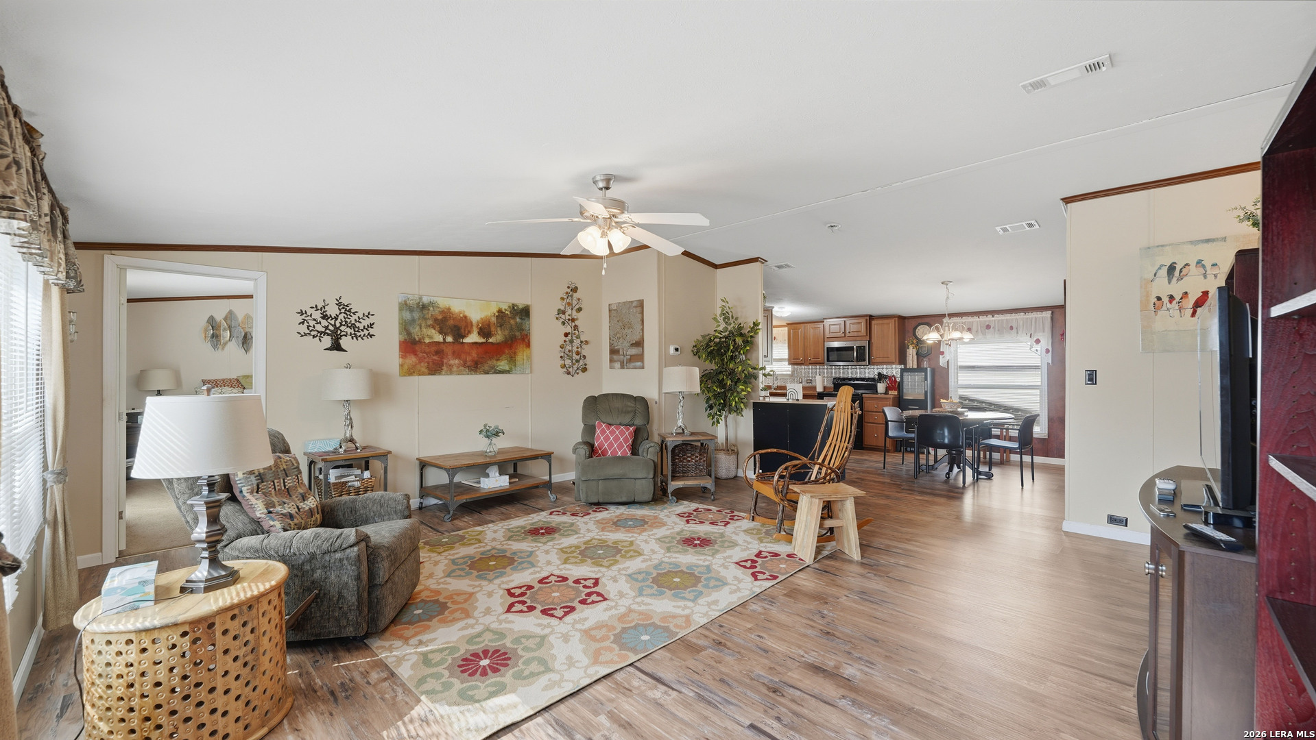22071 Morin Road Von Ormy, TX 78073 - Photo 13 of 31 a living room with furniture and a large window