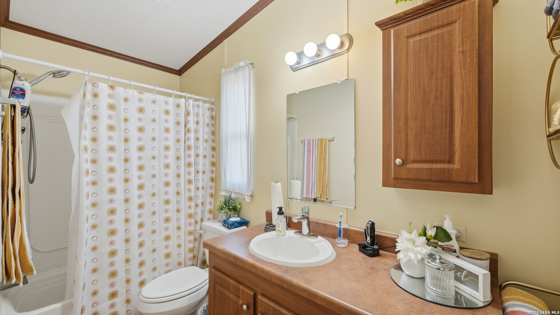 22071 Morin Road Von Ormy, TX 78073 - Photo 19 of 31 a bathroom with a granite countertop sink toilet and shower