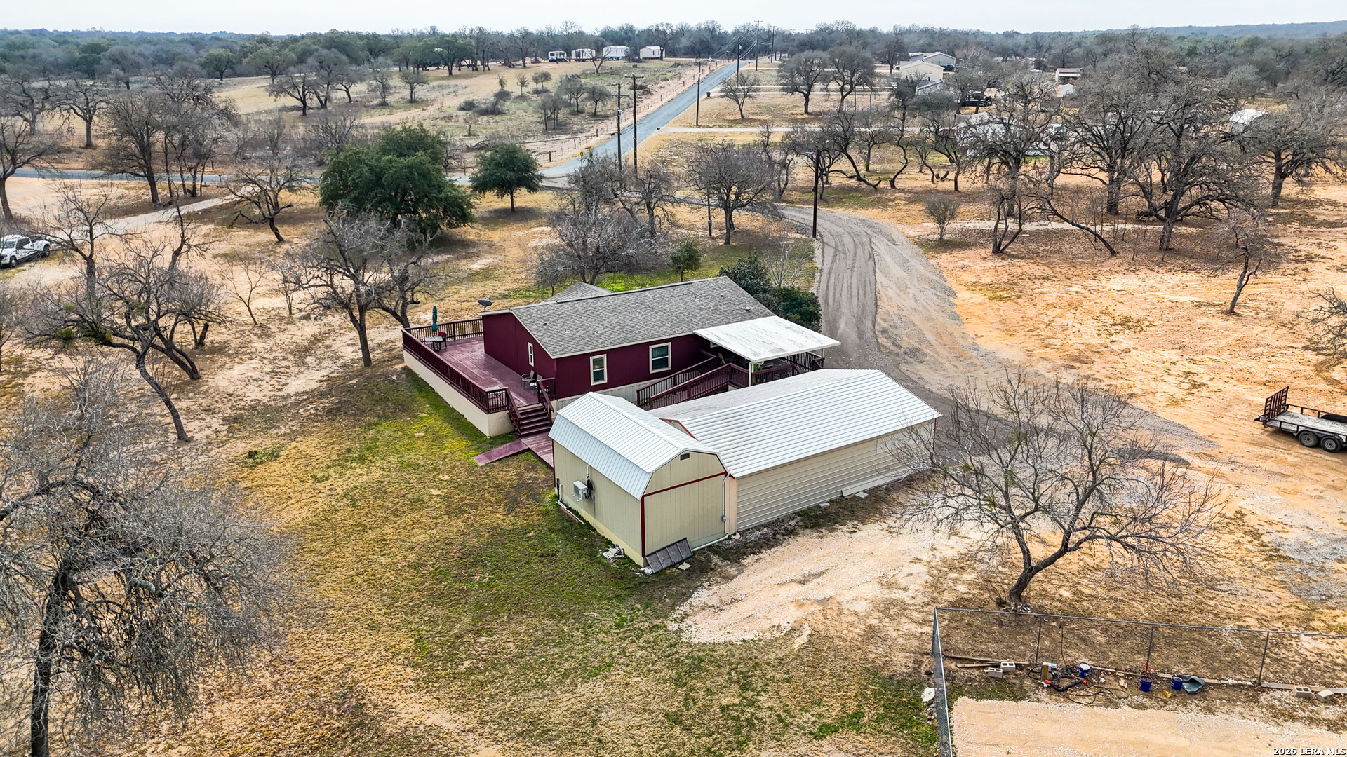 22071 Morin Road Von Ormy, TX 78073 - Photo 28 of 31 a view of a house with a yard
