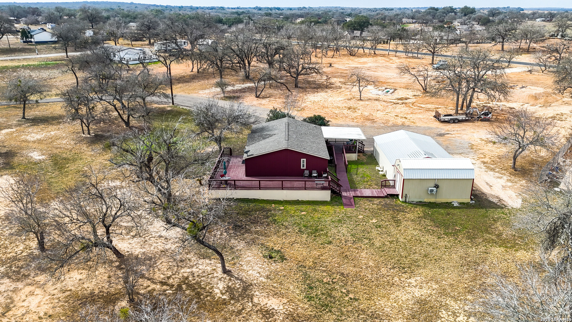 22071 Morin Road Von Ormy, TX 78073 - Photo 30 of 31 a view of a houses with a yard