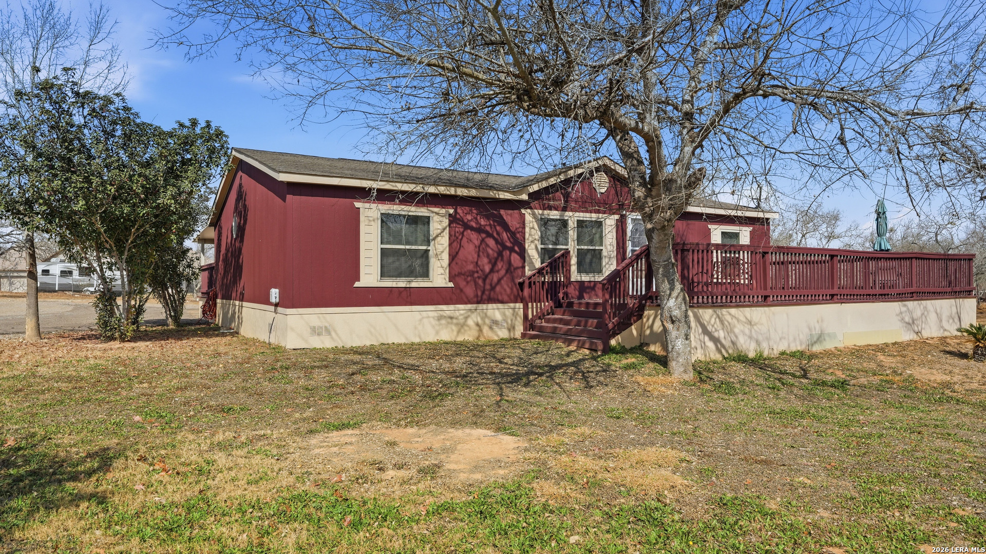22071 Morin Road Von Ormy, TX 78073 - Photo 3 of 31 a view of a house with a yard