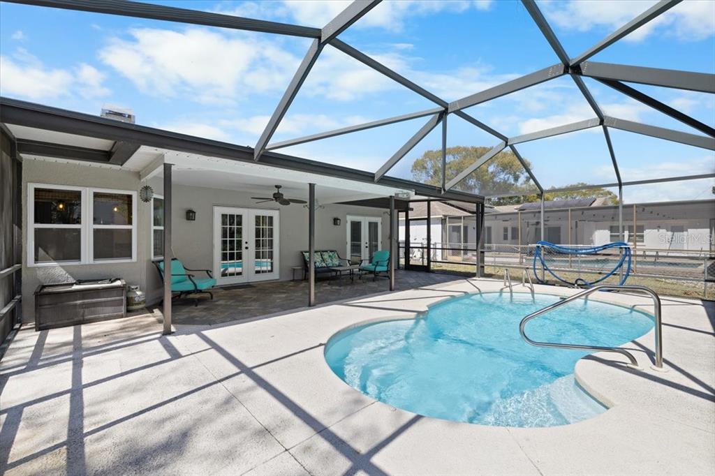4498 Plumosa Street Spring Hill, FL 34607 - Photo 19 of 24 a view of a house with backyard