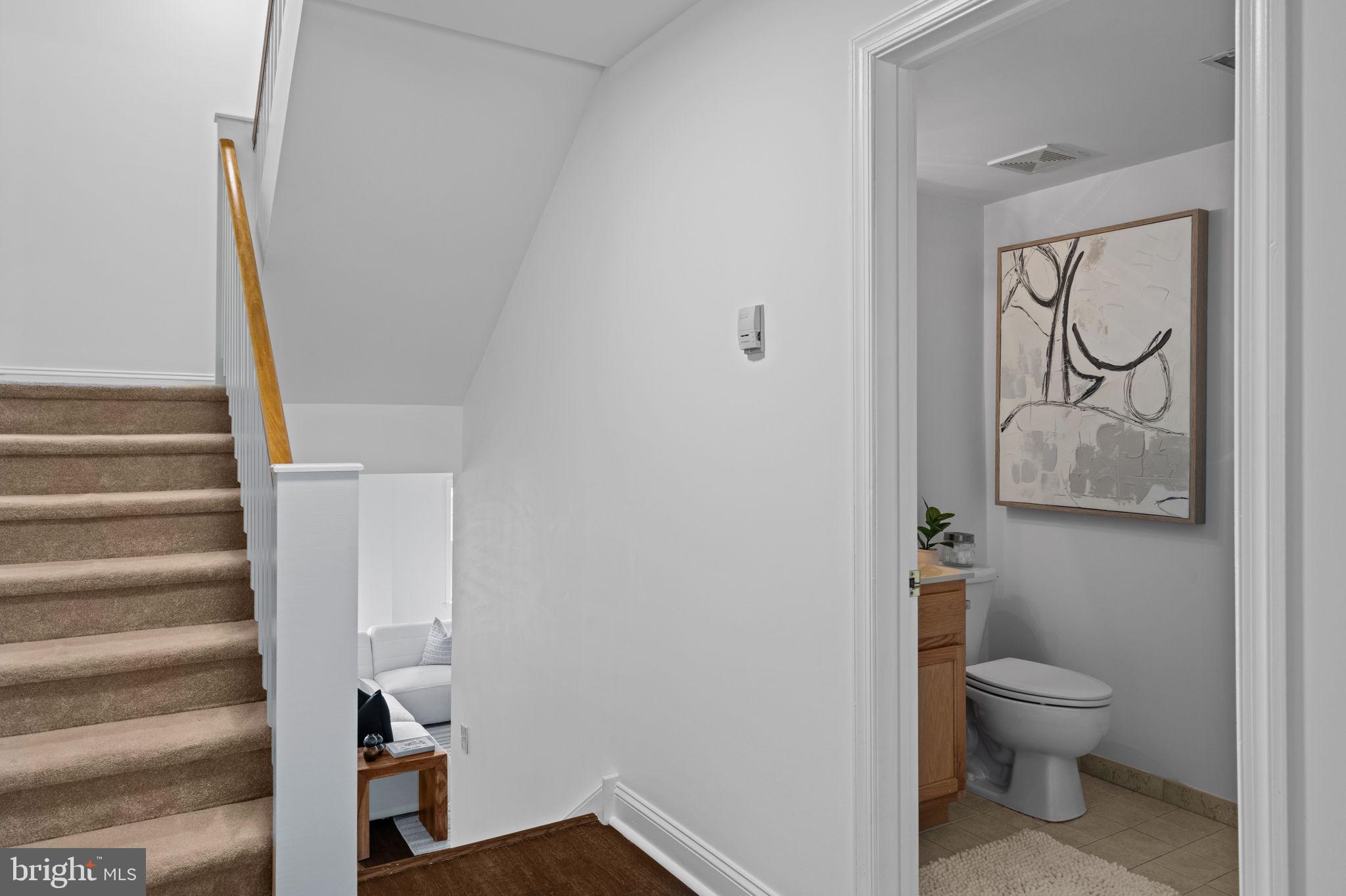 2341 Wallace Street, Unit B Philadelphia, PA 19130 - Photo 11 of 45 a bathroom with a toilet and a sink