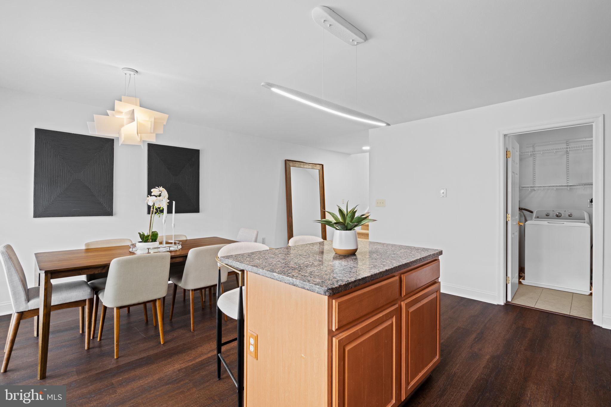 2341 Wallace Street, Unit B Philadelphia, PA 19130 - Photo 20 of 45 a dining room with furniture and wooden floor