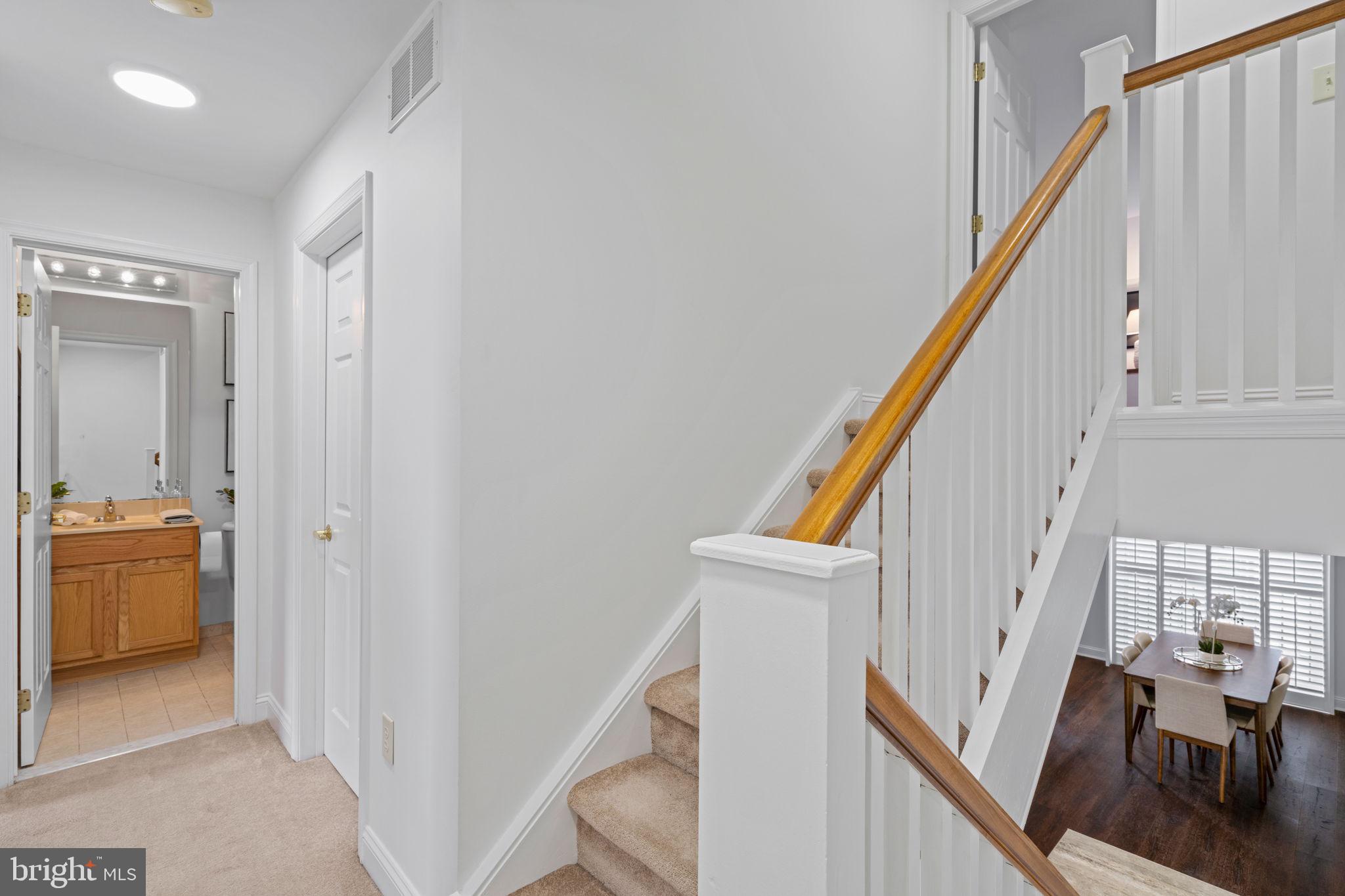 2341 Wallace Street, Unit B Philadelphia, PA 19130 - Photo 23 of 45 a view of an entryway with wooden floor and stairs