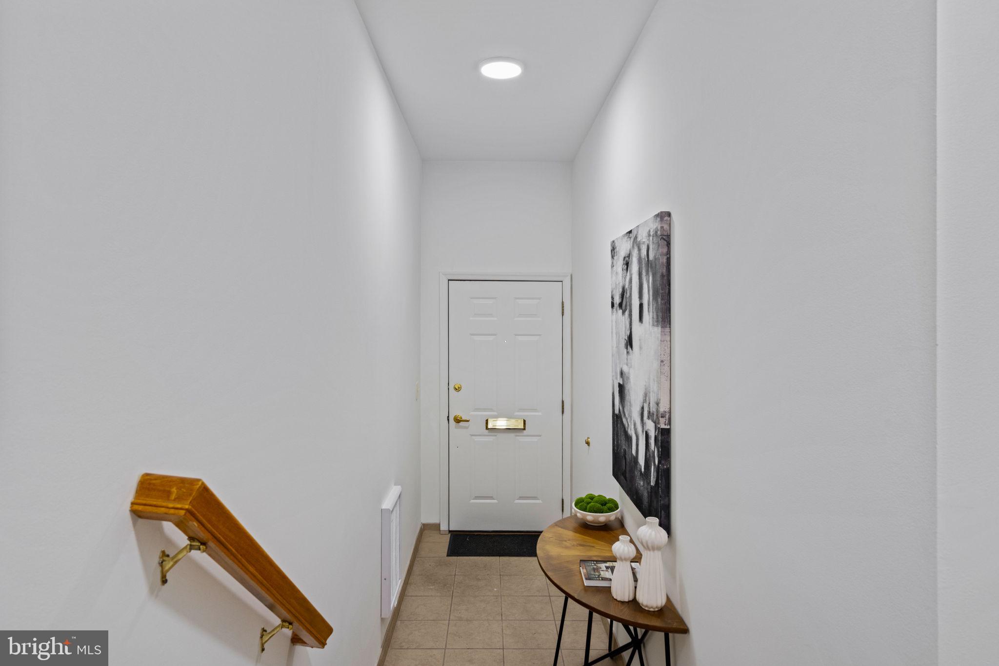 2341 Wallace Street, Unit B Philadelphia, PA 19130 - Photo 3 of 45 a view of an entryway with wooden floor