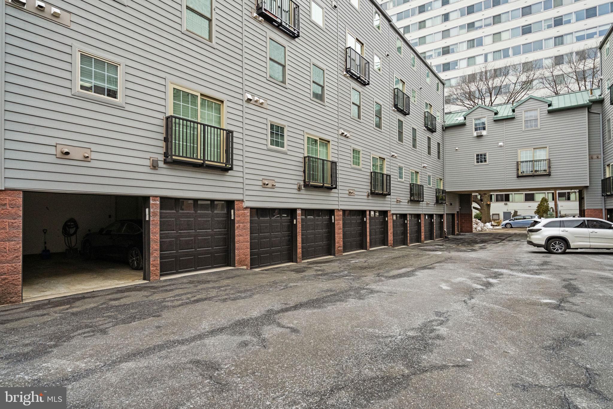 2341 Wallace Street, Unit B Philadelphia, PA 19130 - Photo 41 of 45 a view of a car park in front of building