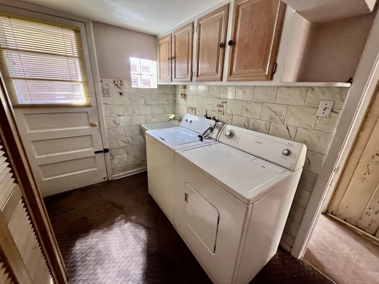 4939 Fargo Avenue Skokie, IL 60077 - Photo 13 of 20 a utility room with dryer and washer