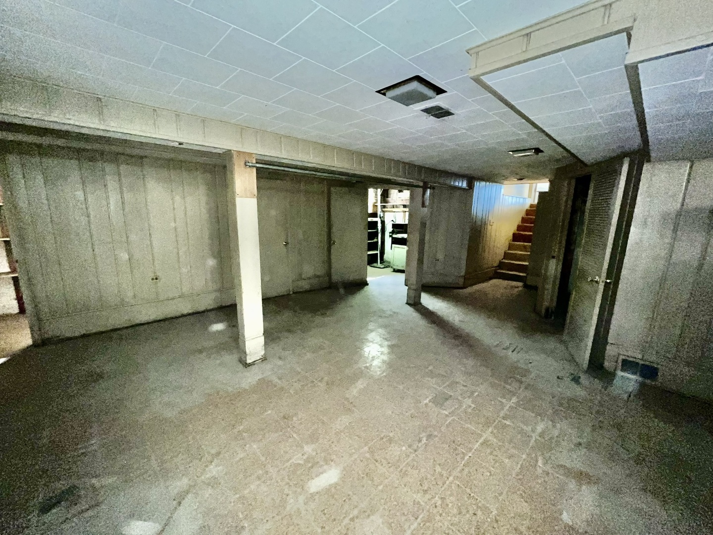 4939 Fargo Avenue Skokie, IL 60077 - Photo 18 of 20 a view of a hallway with wooden walls