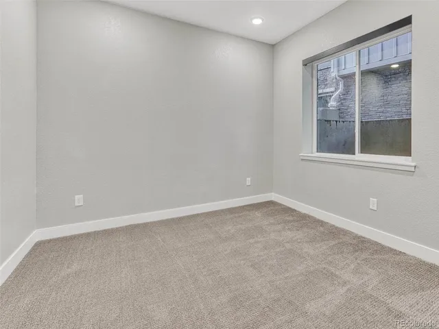 an empty room with an entryway