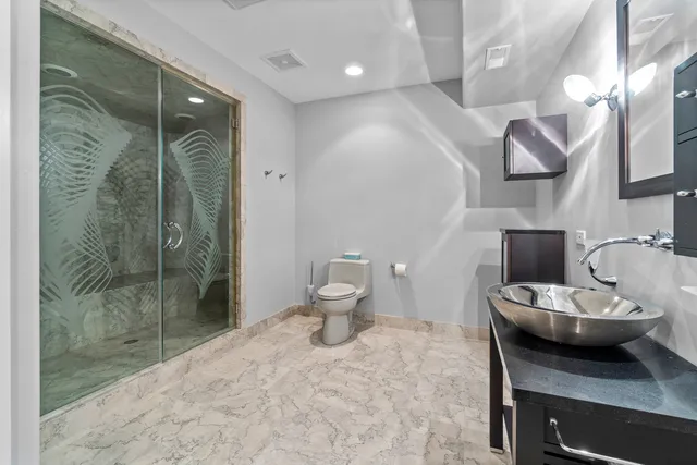 a picture of a bathroom with a sink