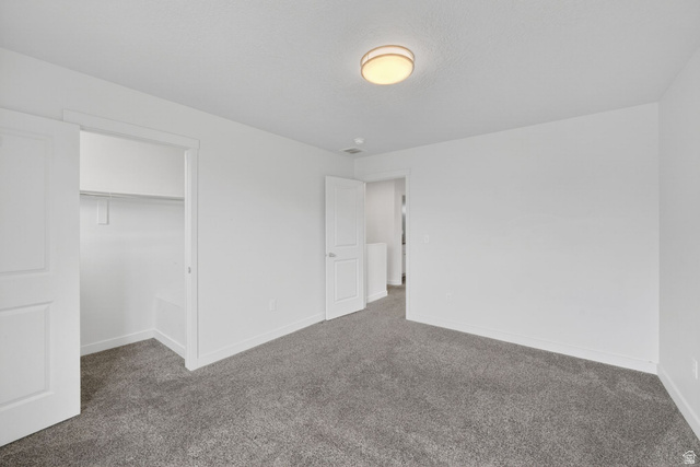 295 Spruce Way Santaquin, UT 84655 - Photo 16 of 32 Room featuring neutral gray carpeting and white walls
