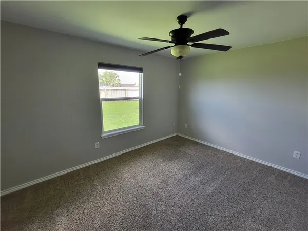 a view of a window in an empty room
