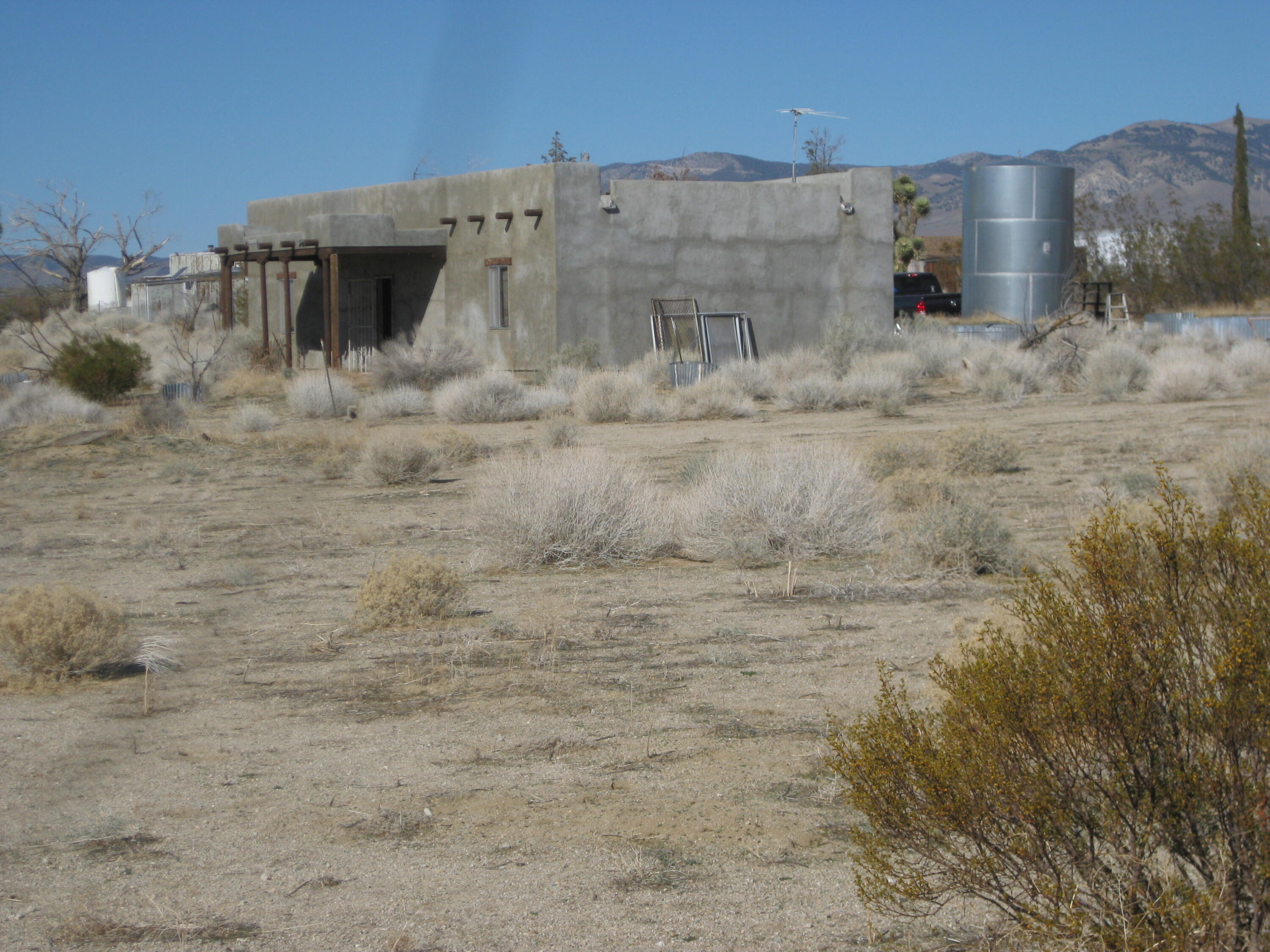 Gaskell Road Rosamond, CA 93560 - Photo 11 of 50 a view of outdoor space with wooden fence